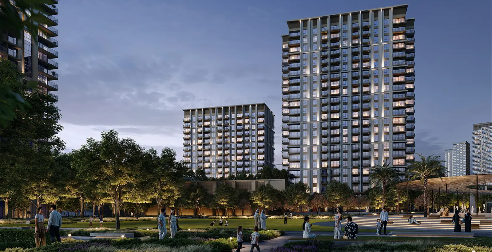 Altus — the two towers above the community lawn at dusk, render (Emaar)