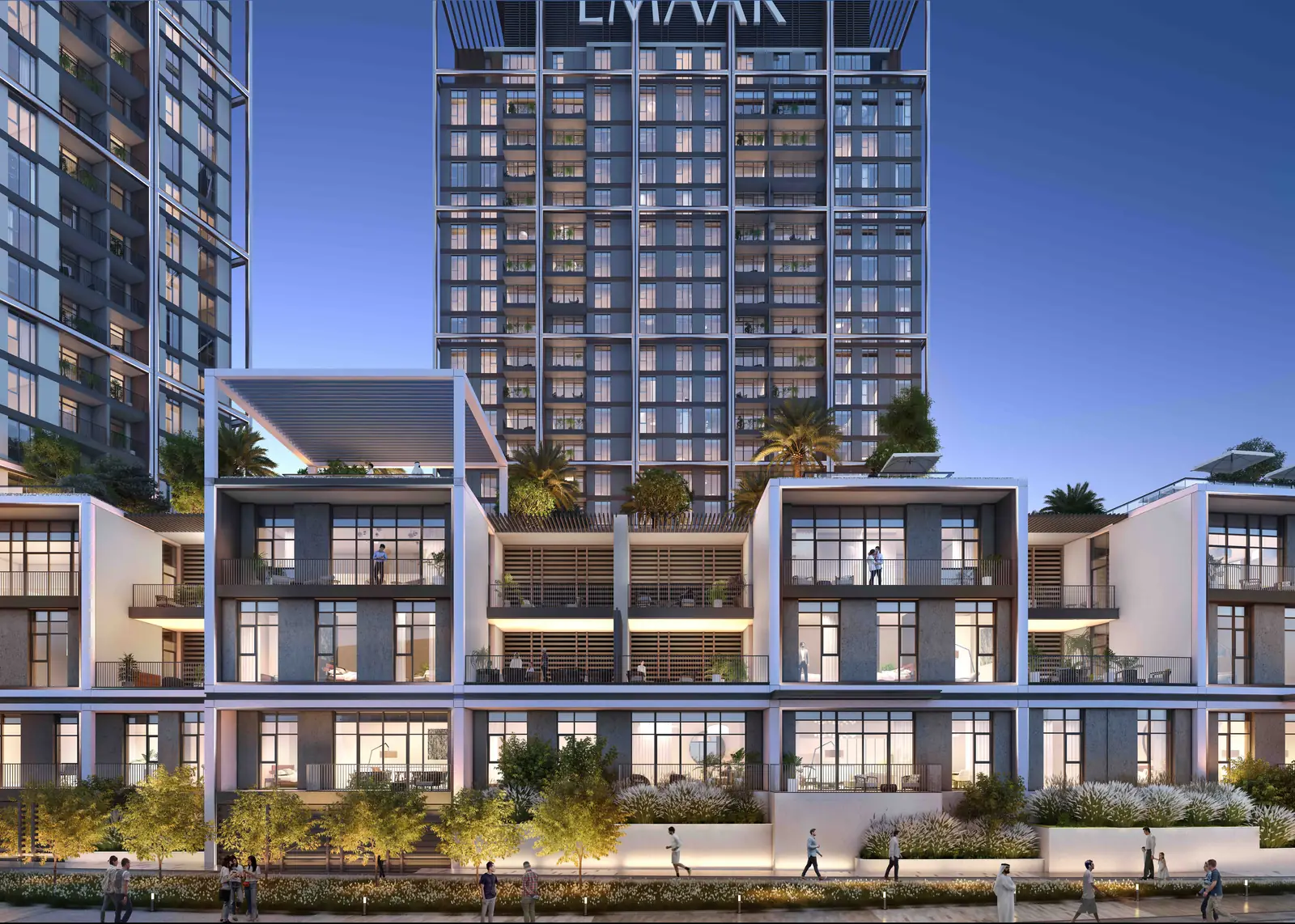 Creek Edge — the tower and its podium homes at dusk, render (Emaar)