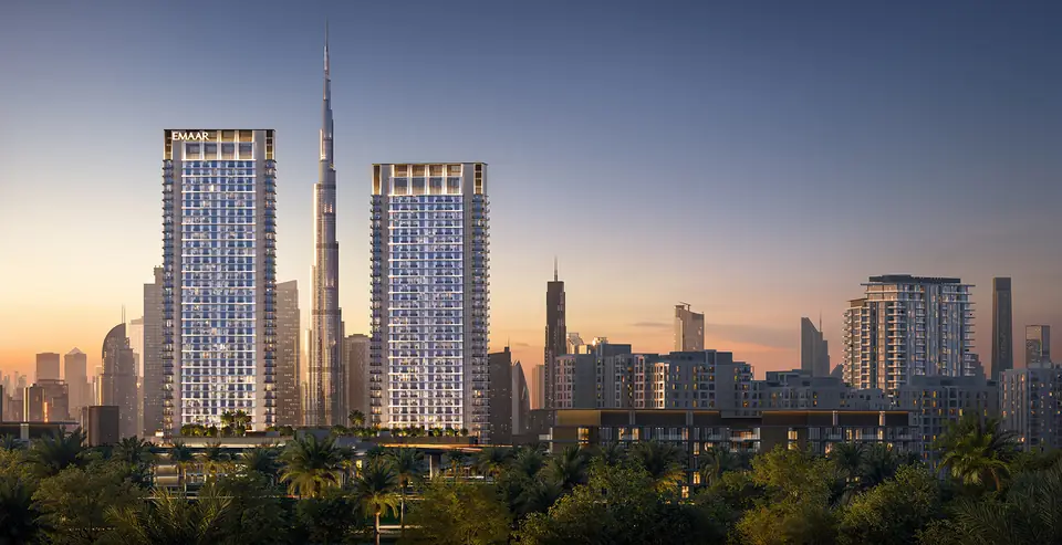 Creek Haven — the two towers at dusk with the Downtown skyline, render (Emaar)