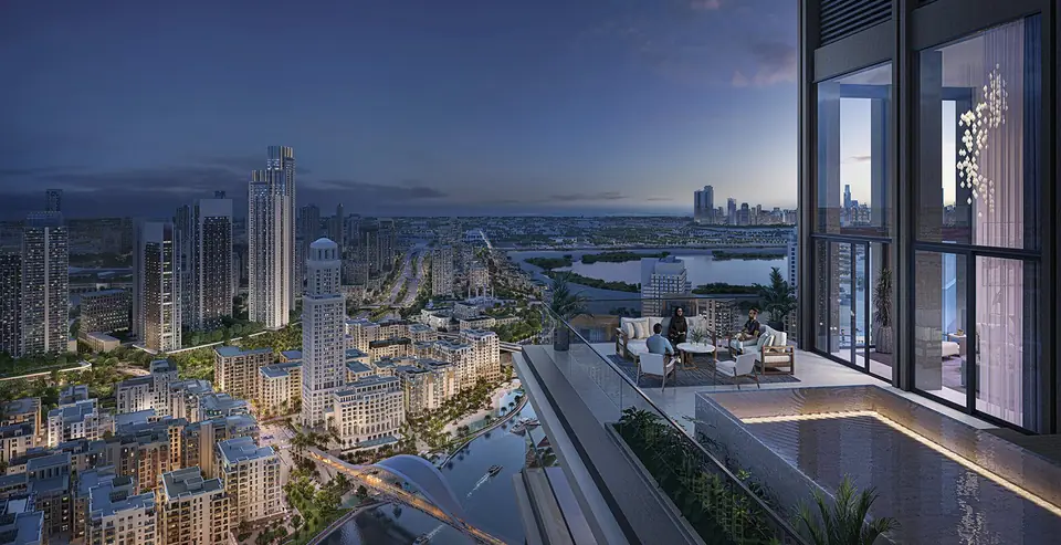 Creek Waters — the towers at dusk with Creek Island bridge, render (Emaar)