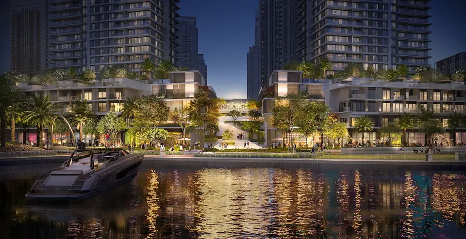 Creek Waters — the waterfront podium at night, render (Emaar)