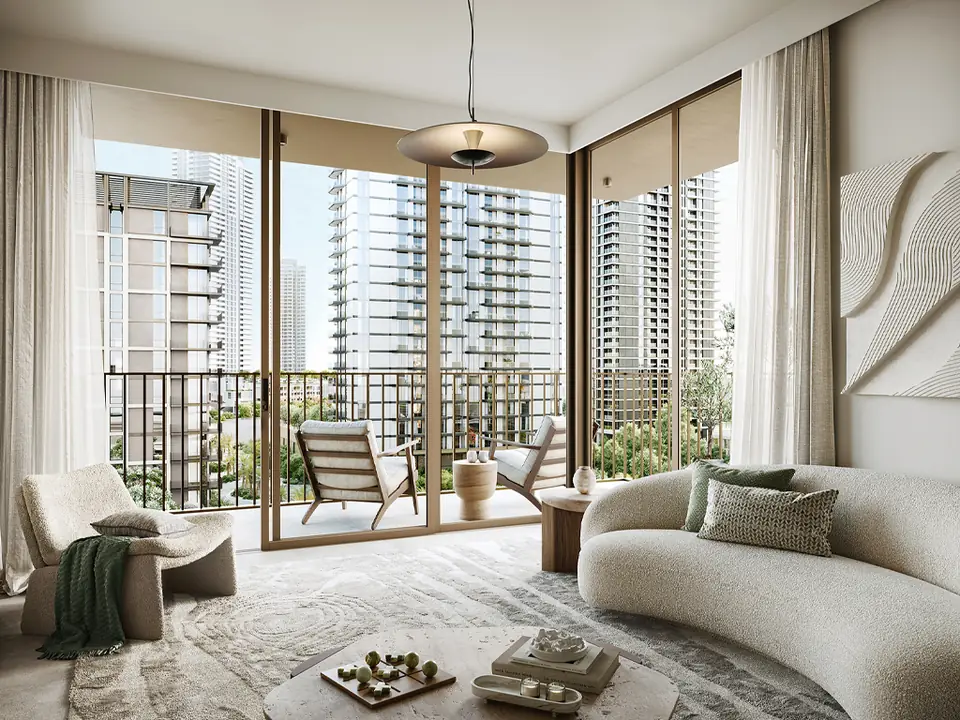 Oria — living room opening onto the balcony, render (Emaar)