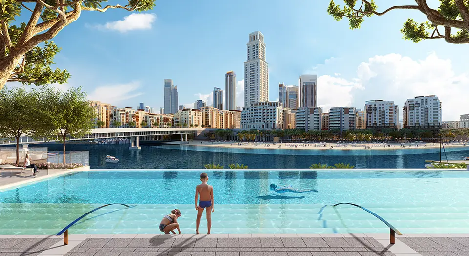 Palace Residences — the pool facing the Creek and skyline, render (Emaar)